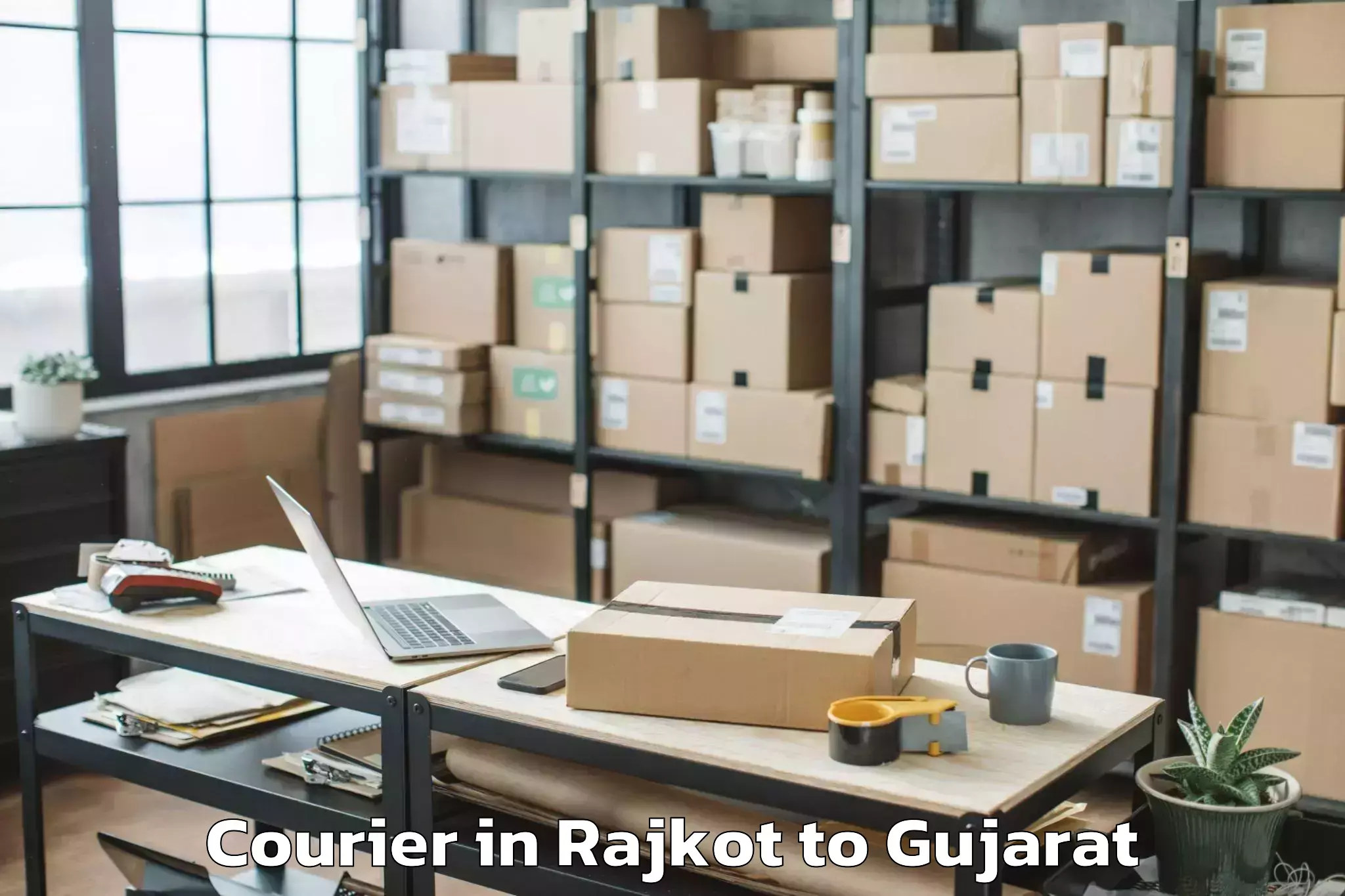 Hassle-Free Rajkot to Uka Tarsadia University Bardol Courier